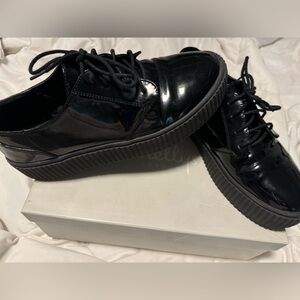 Shelly’s London Black Patent sneakers